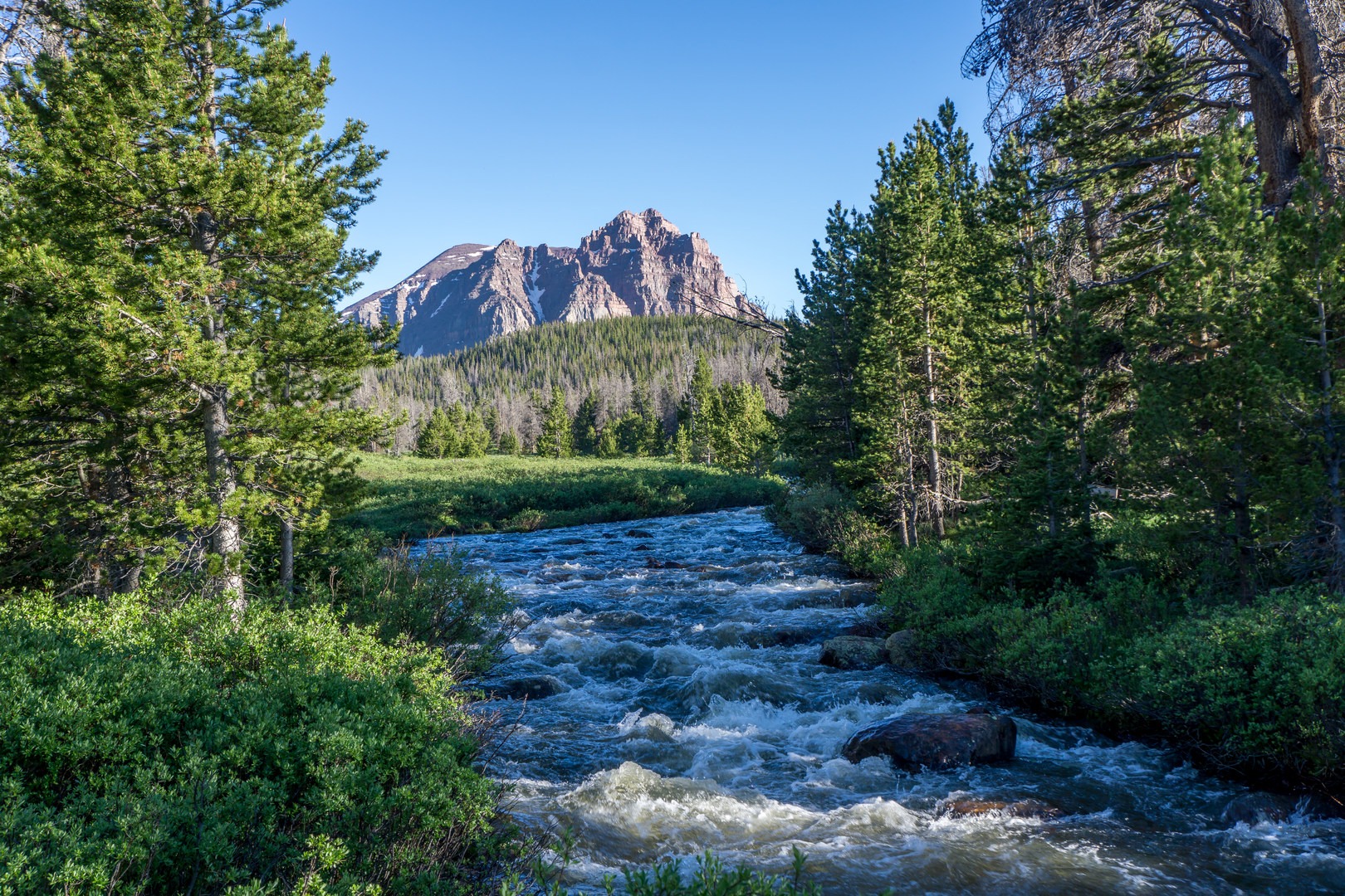A first glimpse of Red Castle Peak.