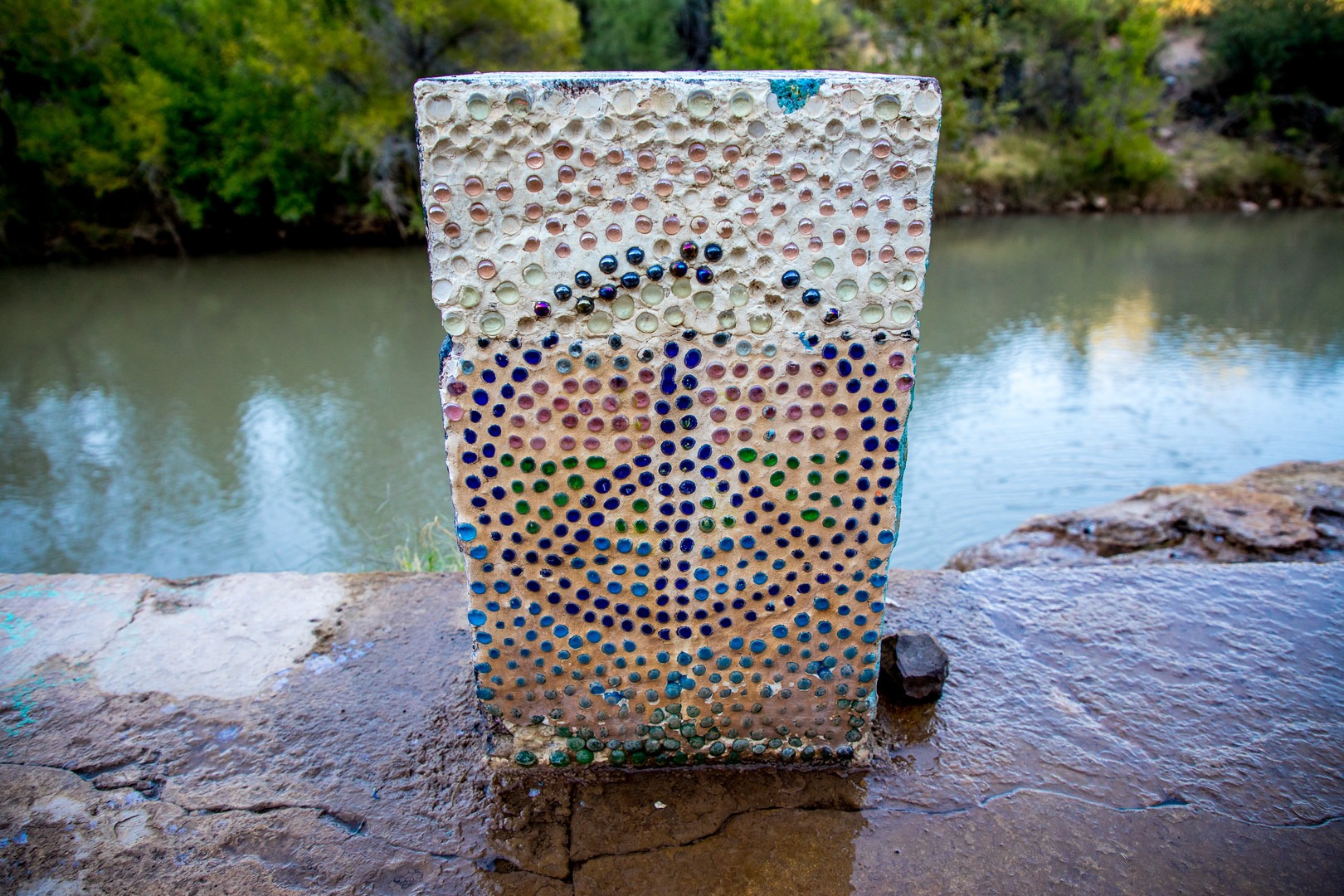 Some art on a pillar next to the main pool.