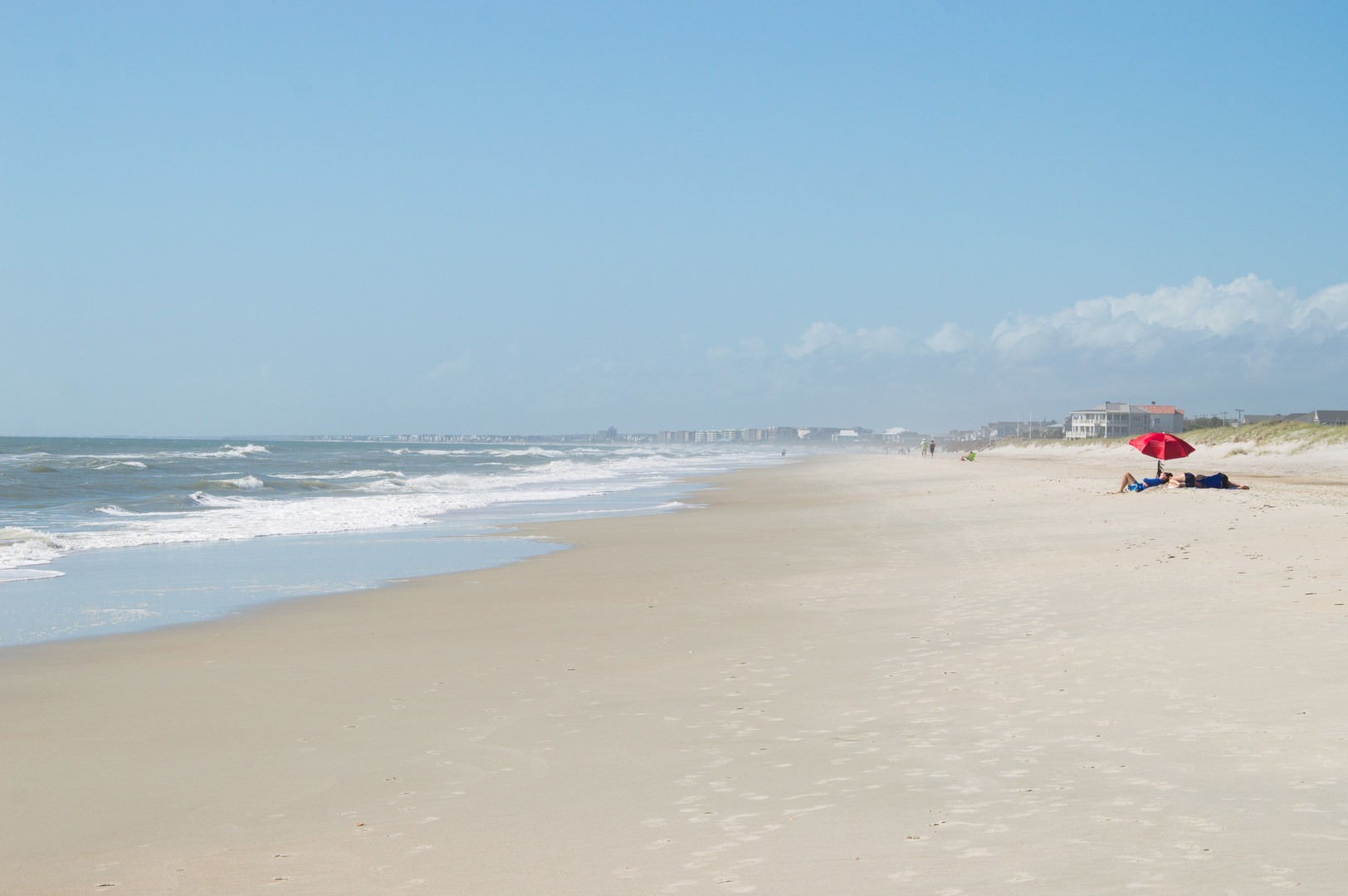 Wide, white sand beach.