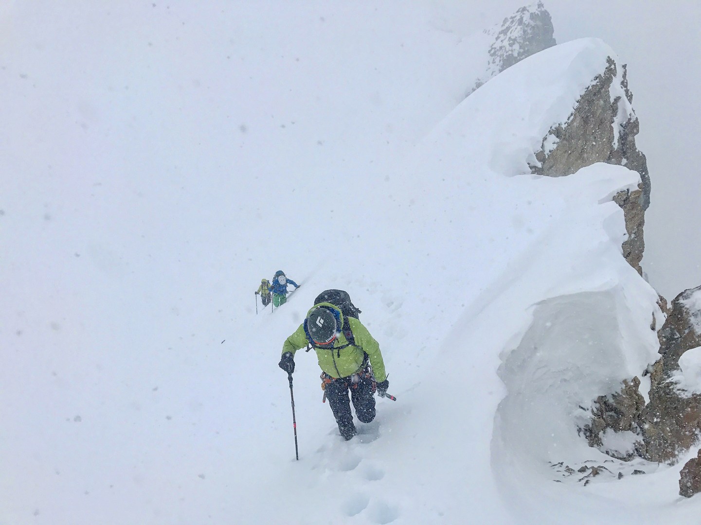 Boot packing up the ridge to the summit.