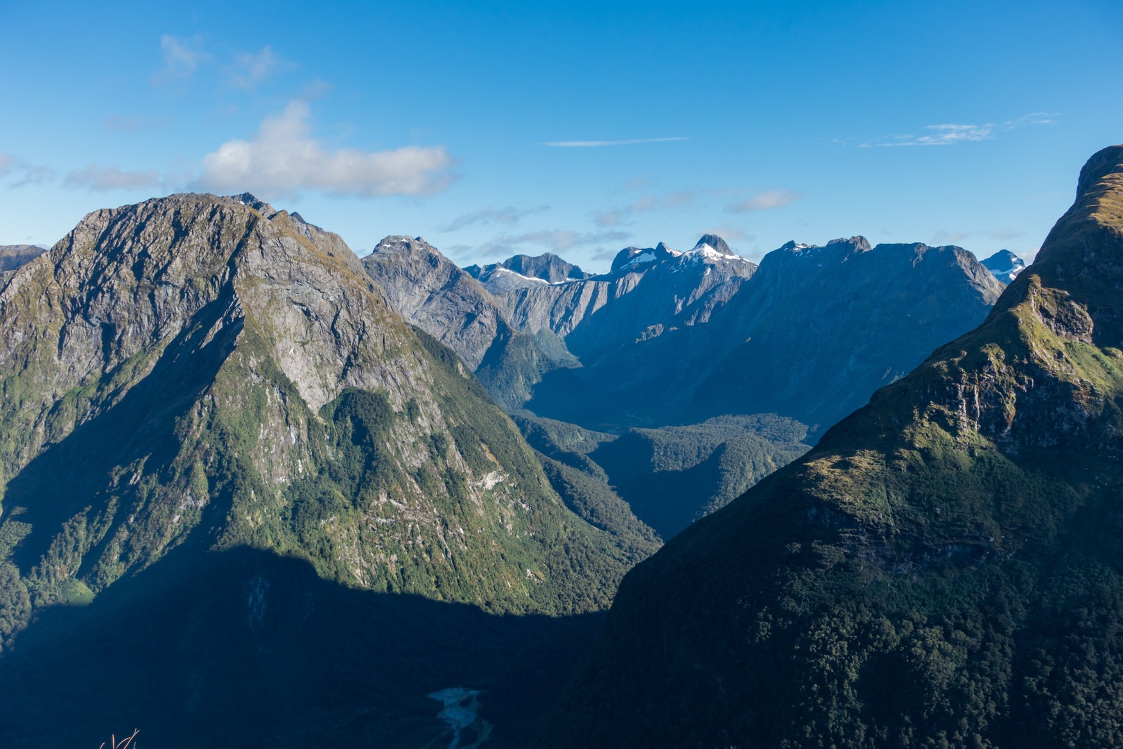 A sea of prominent cliffs fill the distance.