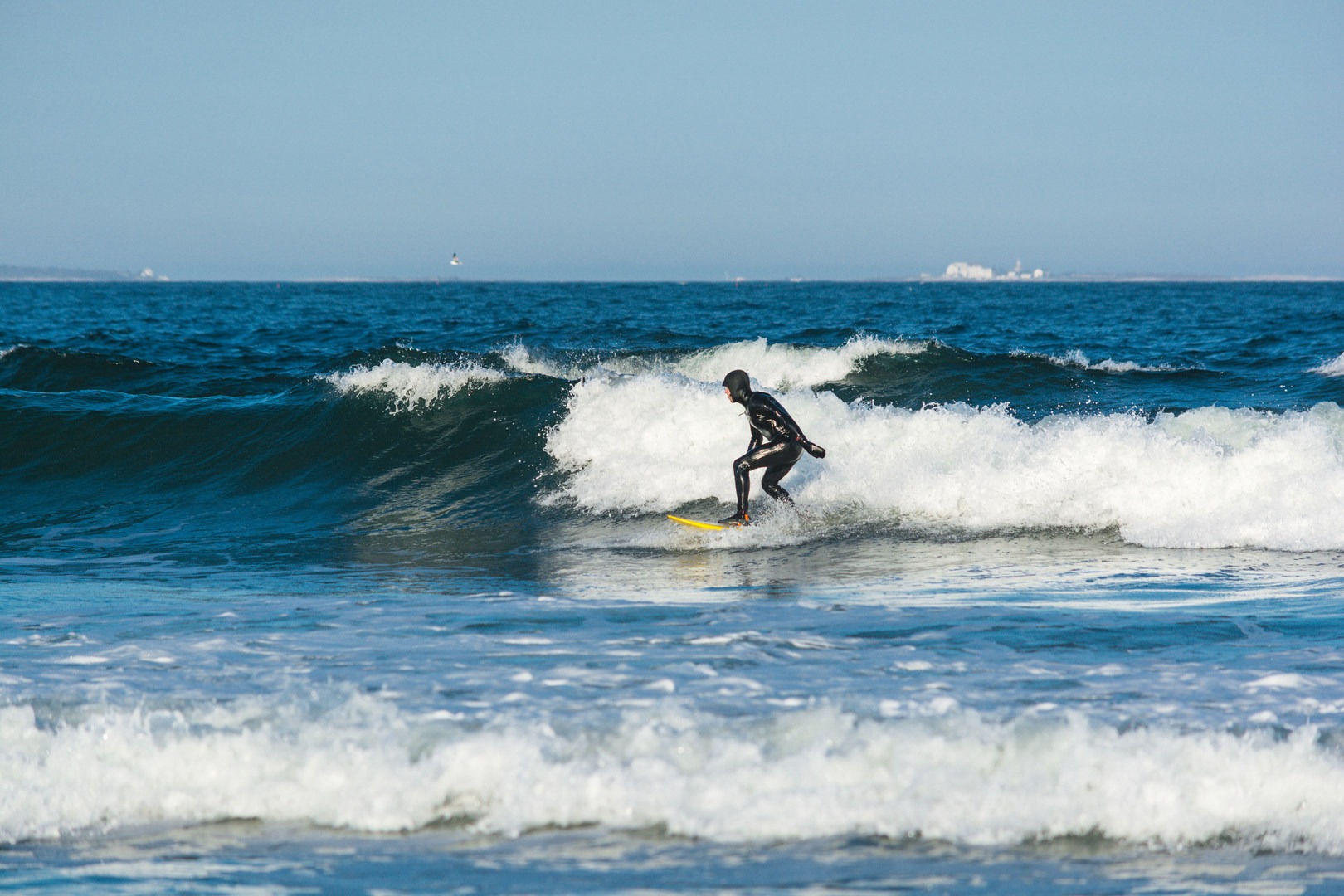 Surfing at Jenness State Beach.