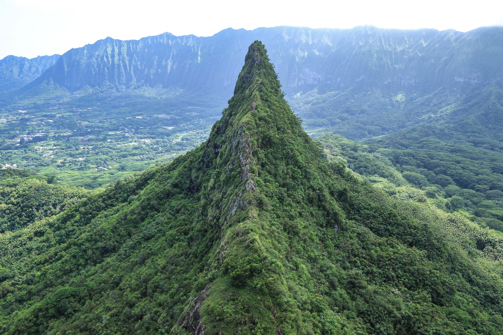 Looking out upon the razor-sharp third peak of Olomana Ridge.