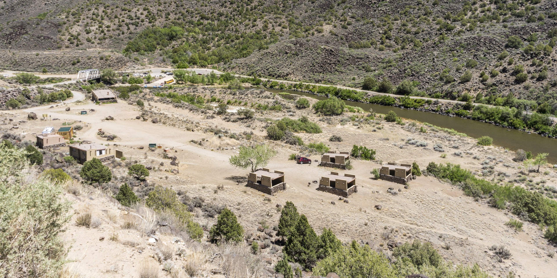 View of Taos Junction Campground from the road above.