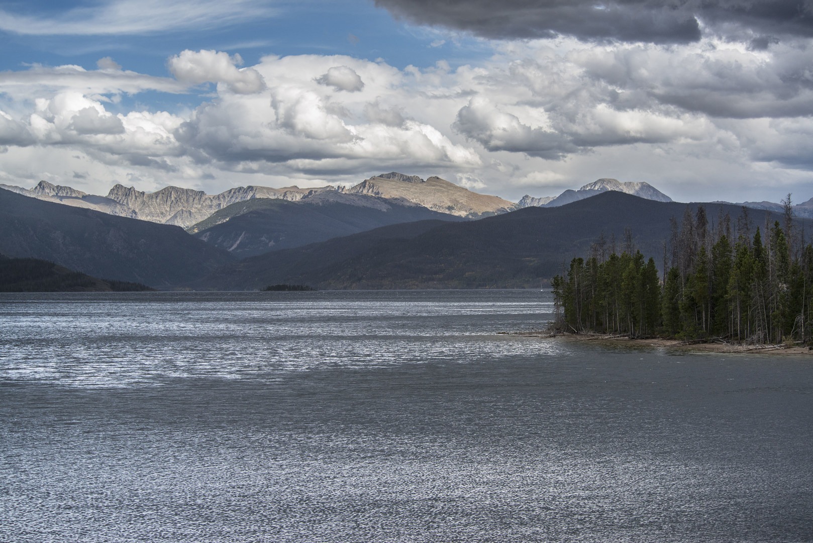 View southeast toward the Indian Peaks Wilderness including North Arapaho Peak (13,502 ft) at far right past Lake Granby.