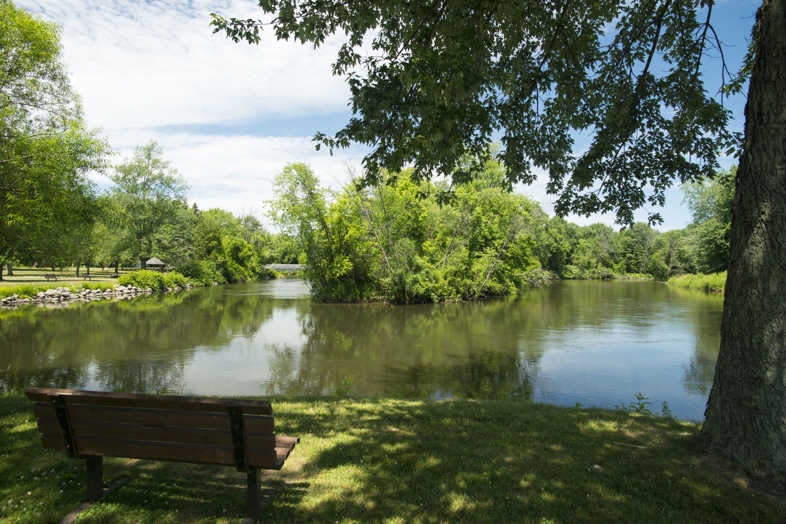 A bench in the picnic area at Scottville Riverside Park.