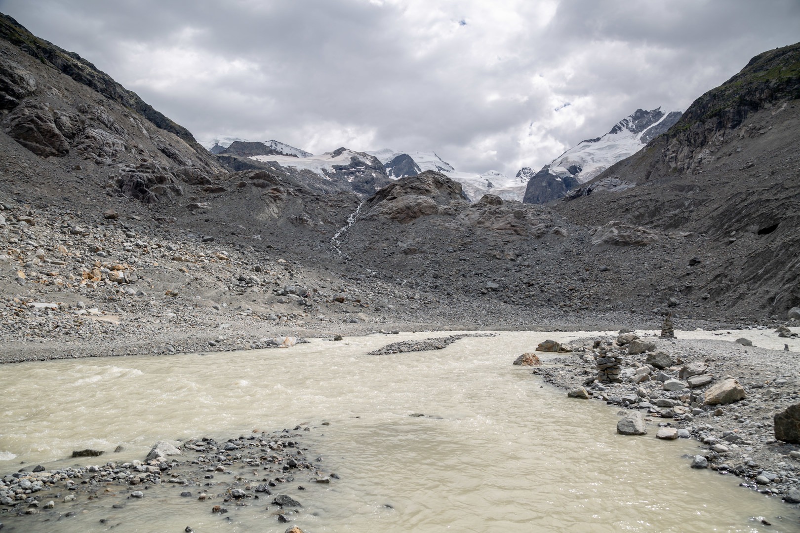 The glacier has mostly retreated back over a large rock outcrop, but you can still see parts of the glacier as well as several large waterfalls that run down the rocks.