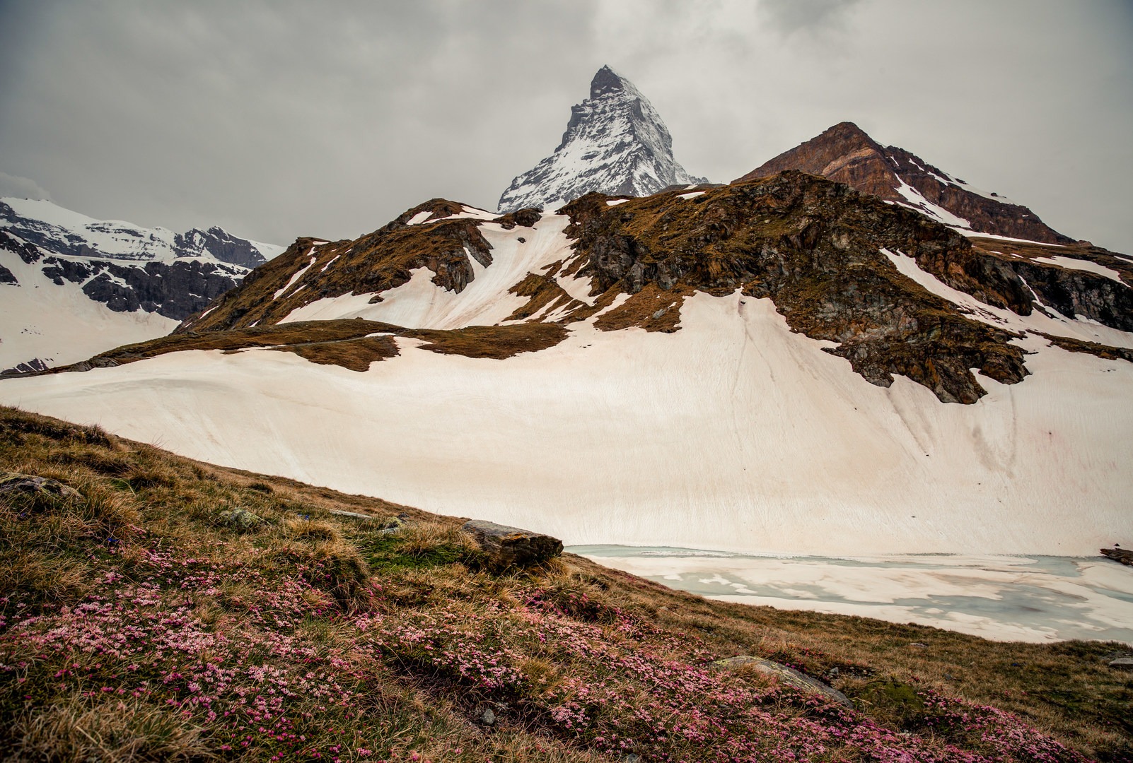 The Matterhorn seen above the ridge at Schwarzsee. The lake remains frozen until June at least.