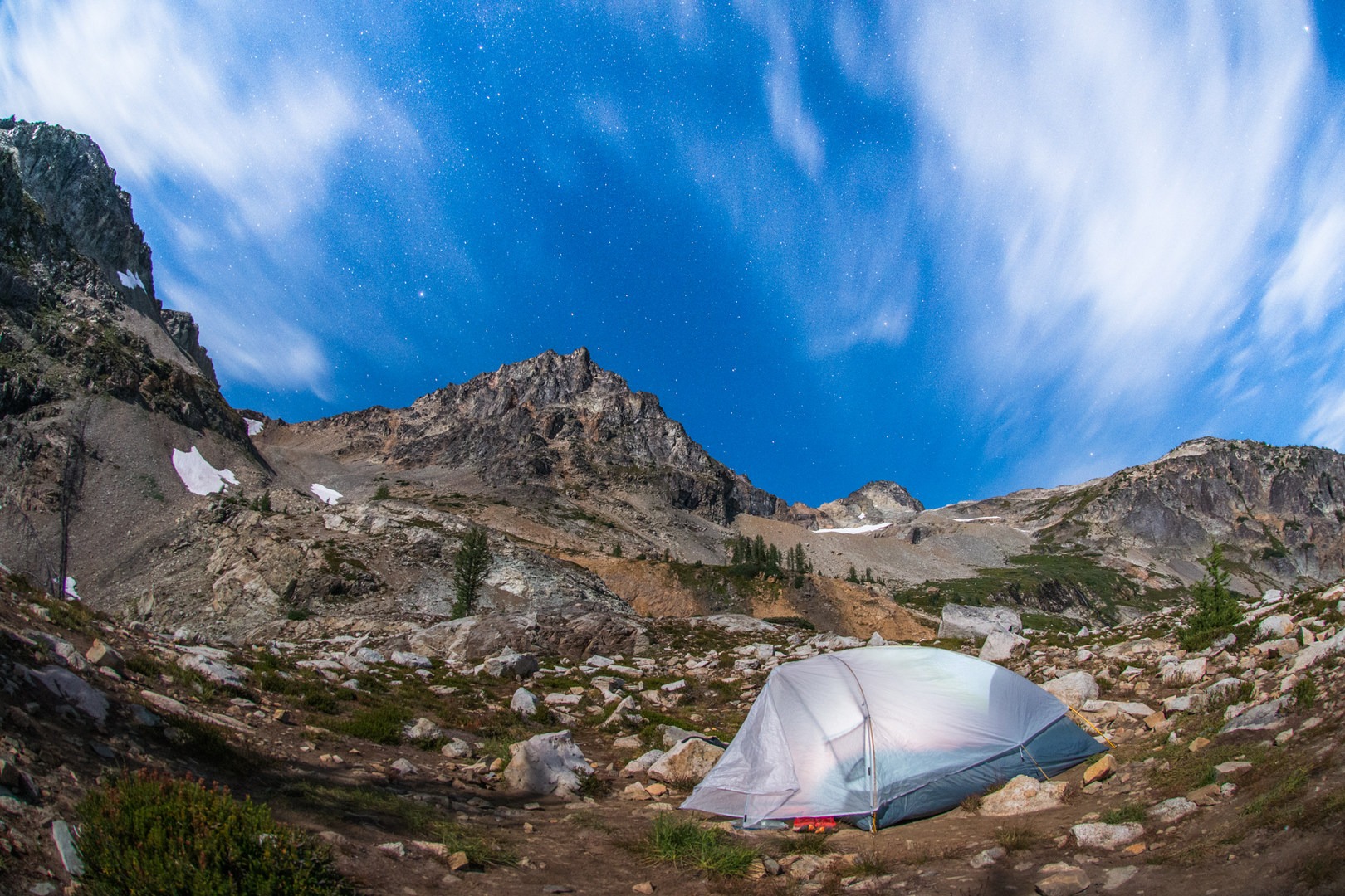 Full moon lighting camp and Black Peak.