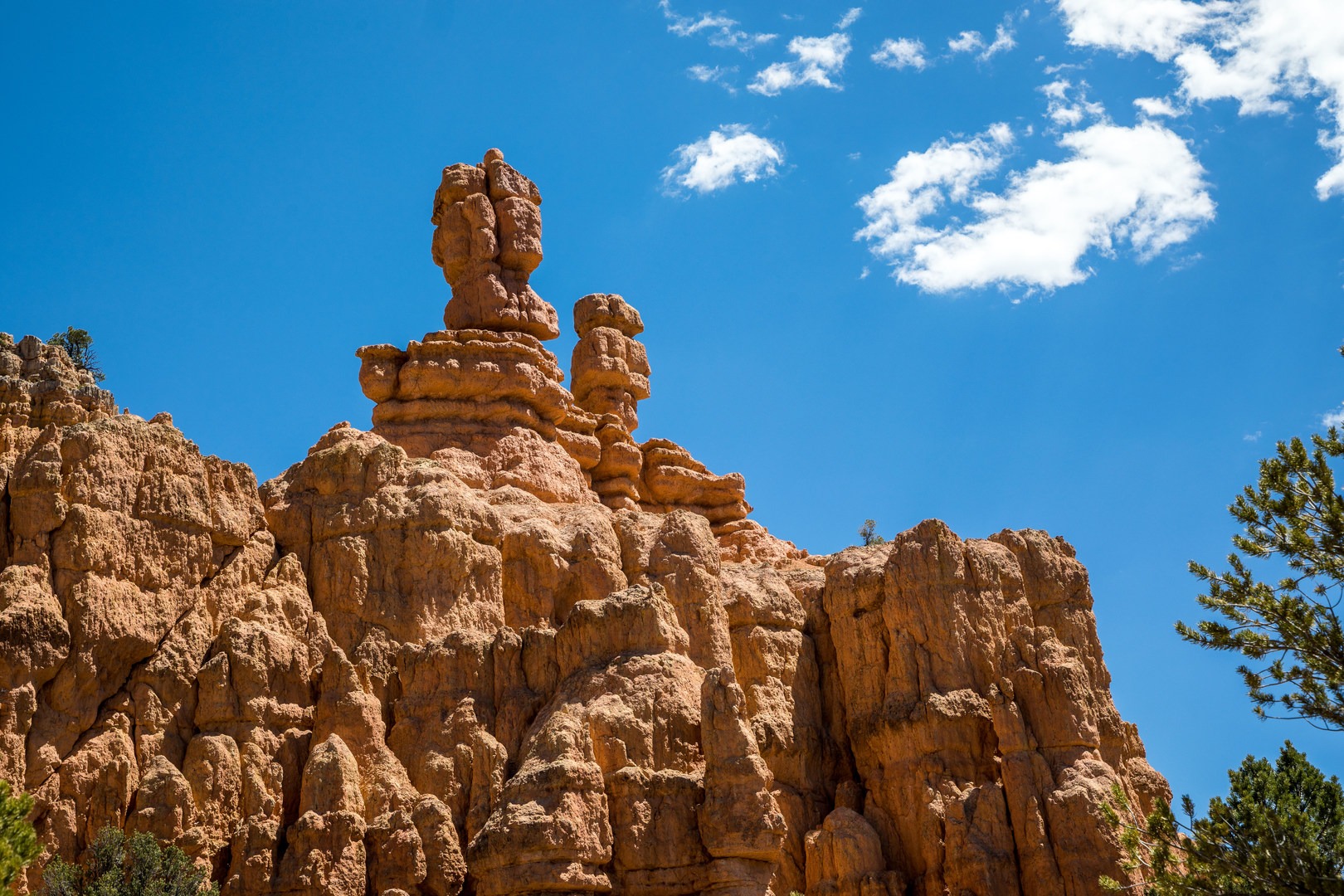 A closer view of the two prominent hoodoo rock formations along the trail.