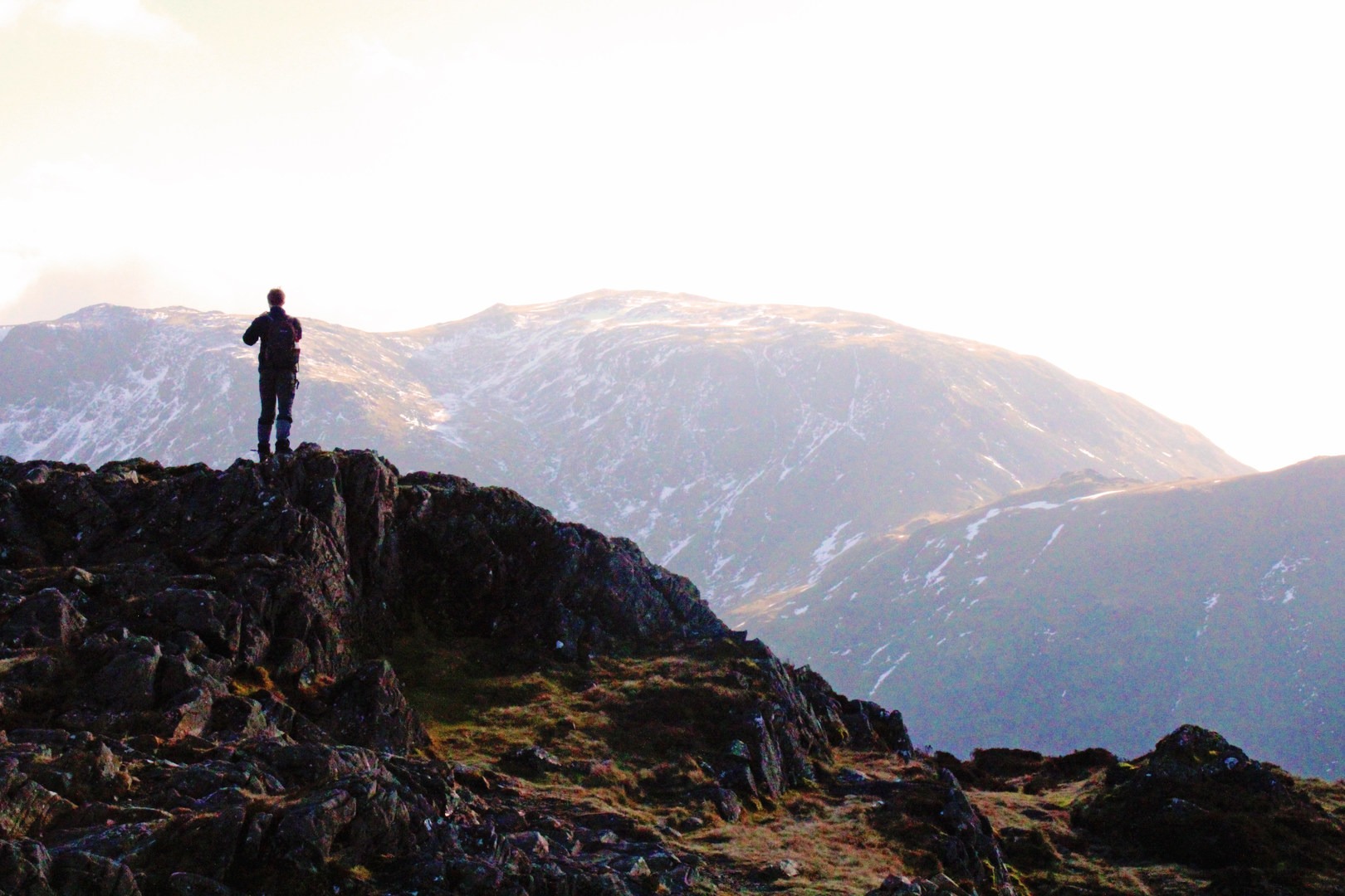 Basking in the start of evening alpenglow from the summit of Brandreth (715 m).