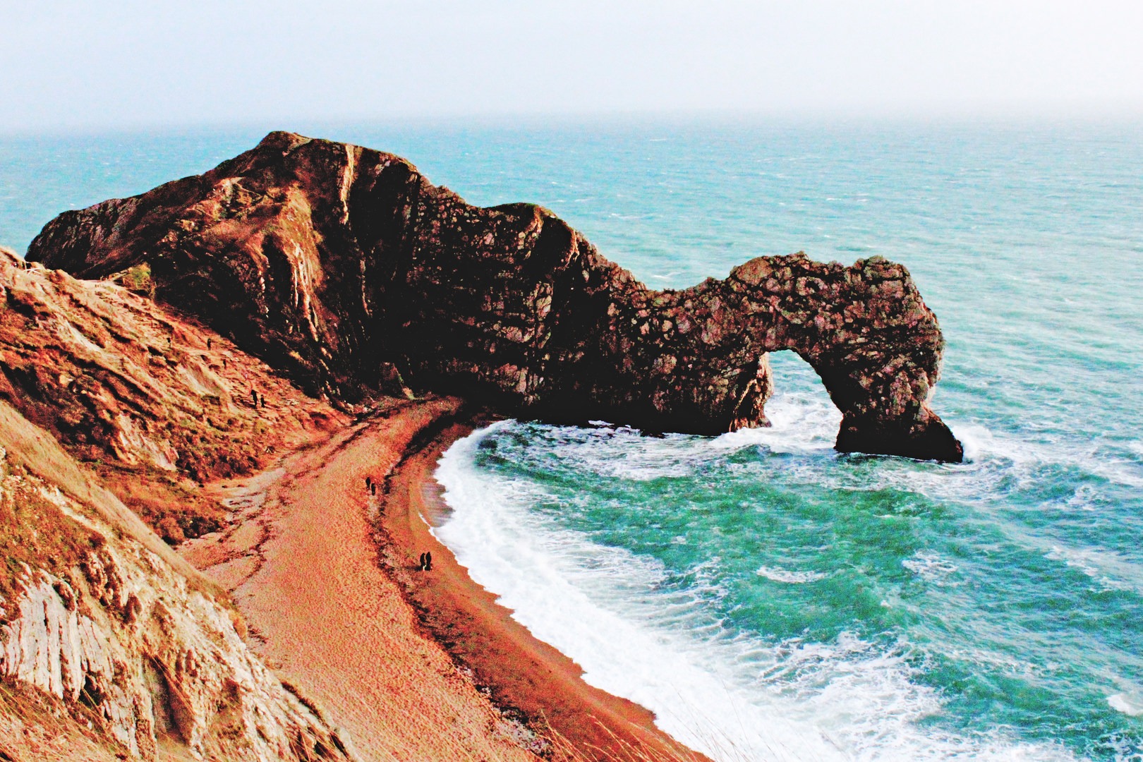 The most iconic view of Durdle Door, standing just west of the feature along the Southwest Coast Path.