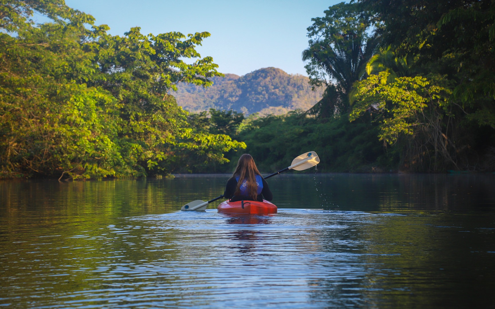 Paddling toward the southern Belizean jungle.