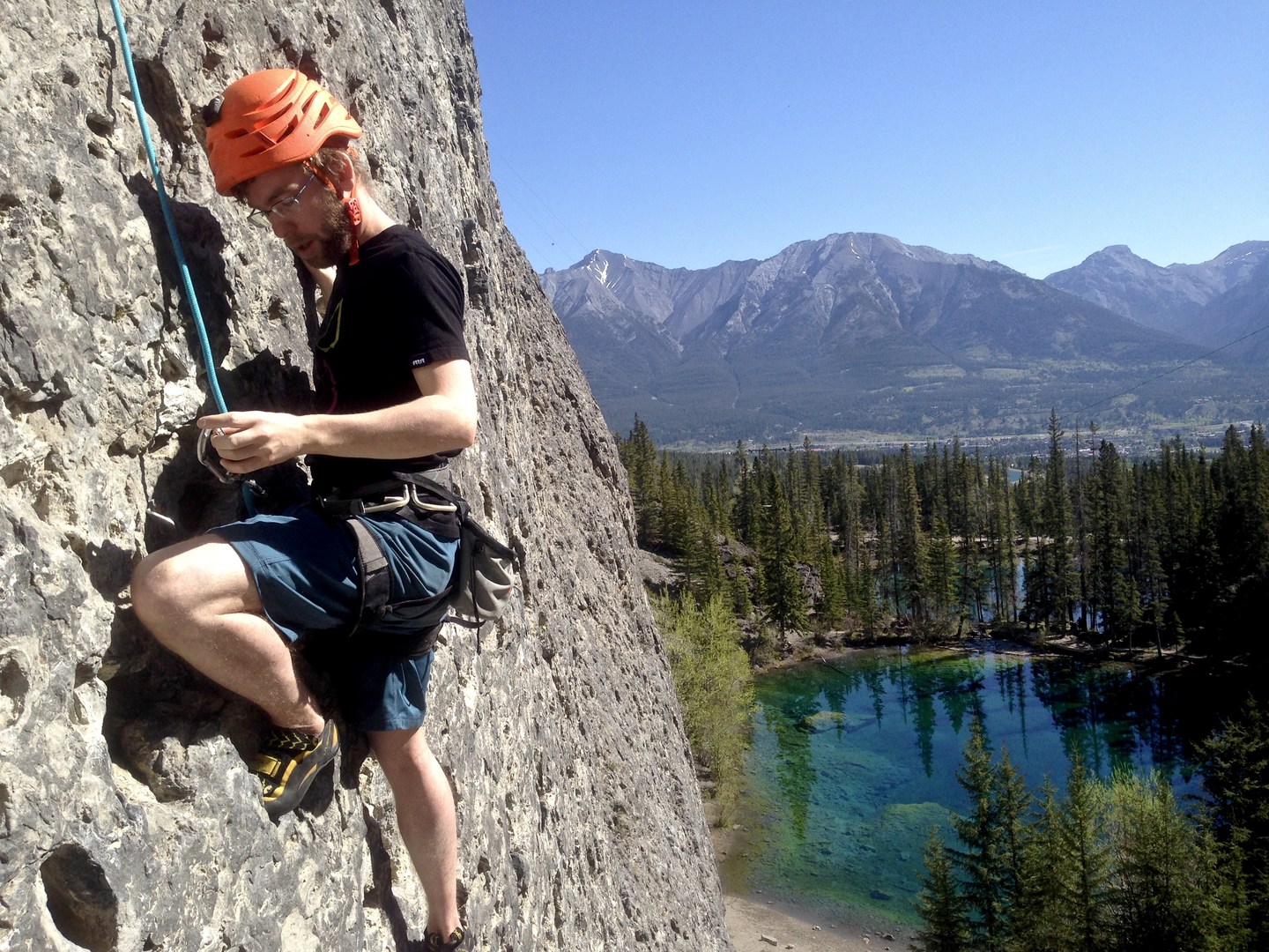 Climbing above the namesake lake, a beautiful spot that draws people just to come see it. Note the pockmarked and grooved walls.