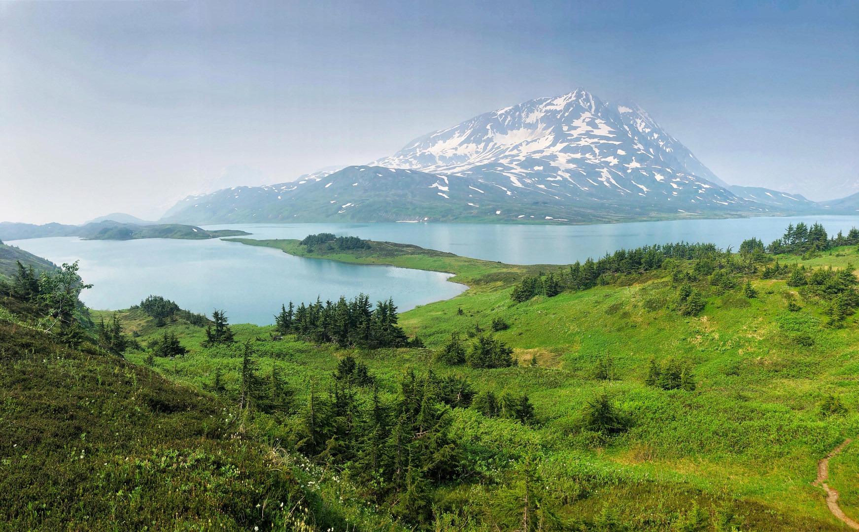 Lost Lake, its peninsulas, and Mount Ascension in the background. For those looking for an extra challenge, Mount Ascension is climbable, but that's an entirely different beast.