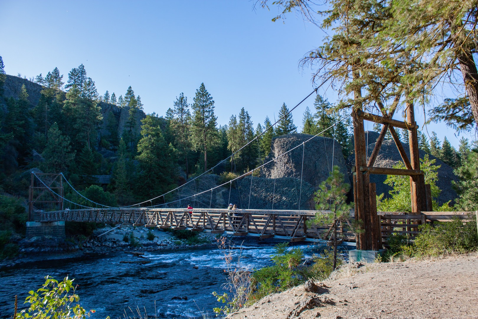 The Bowl and Pitcher Swinging Bridge with the rushing Spokane River below.