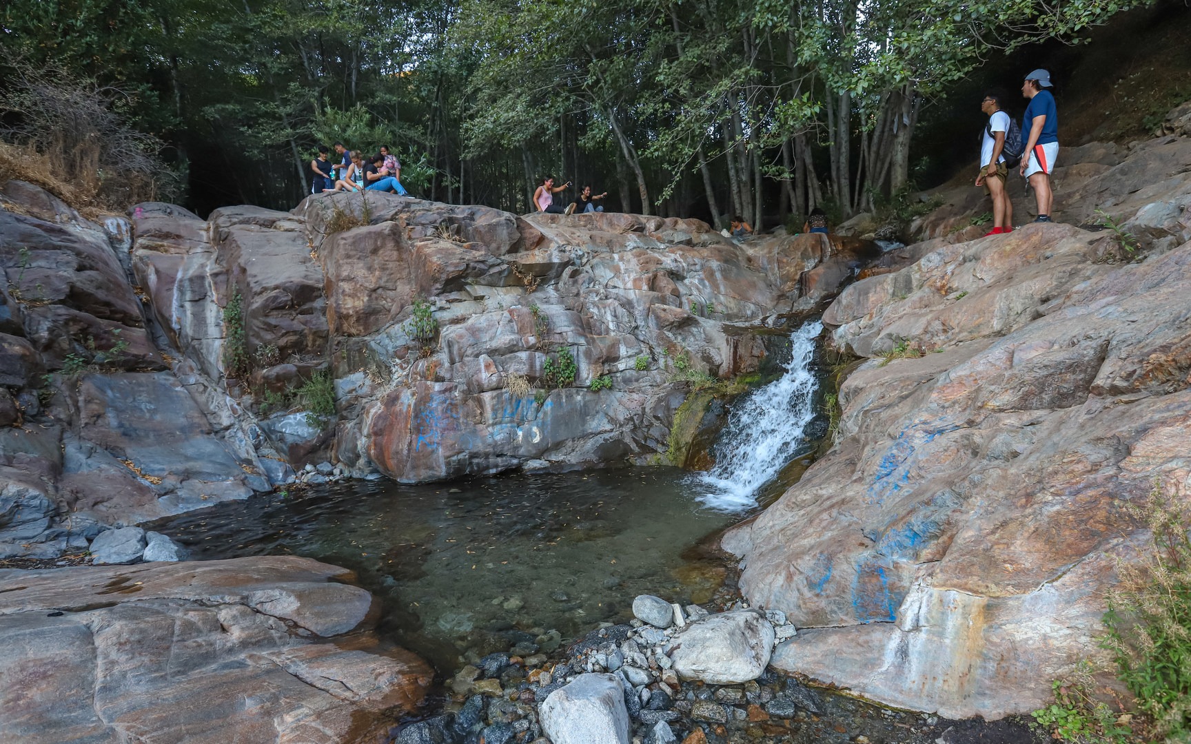 Etiwanda Falls' proximity to the metro area shapes the atmosphere at the waterfall.