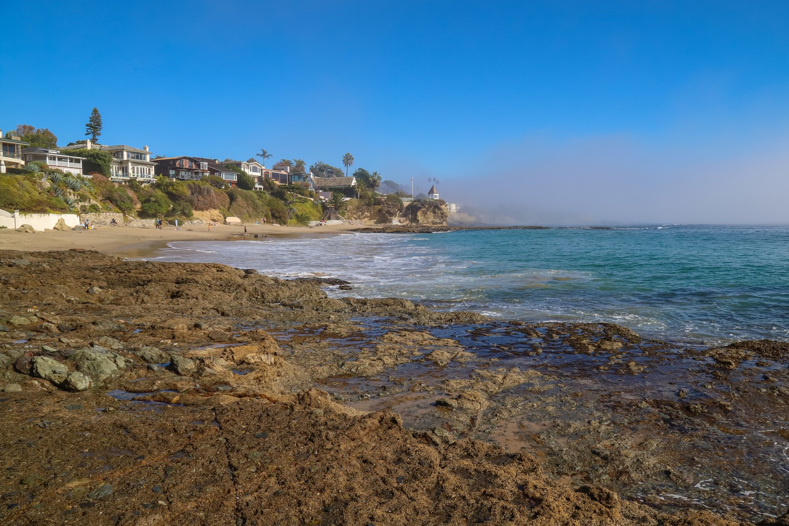 The cove tends to make the waves smaller here than other nearby beaches making it a popular destination for families.