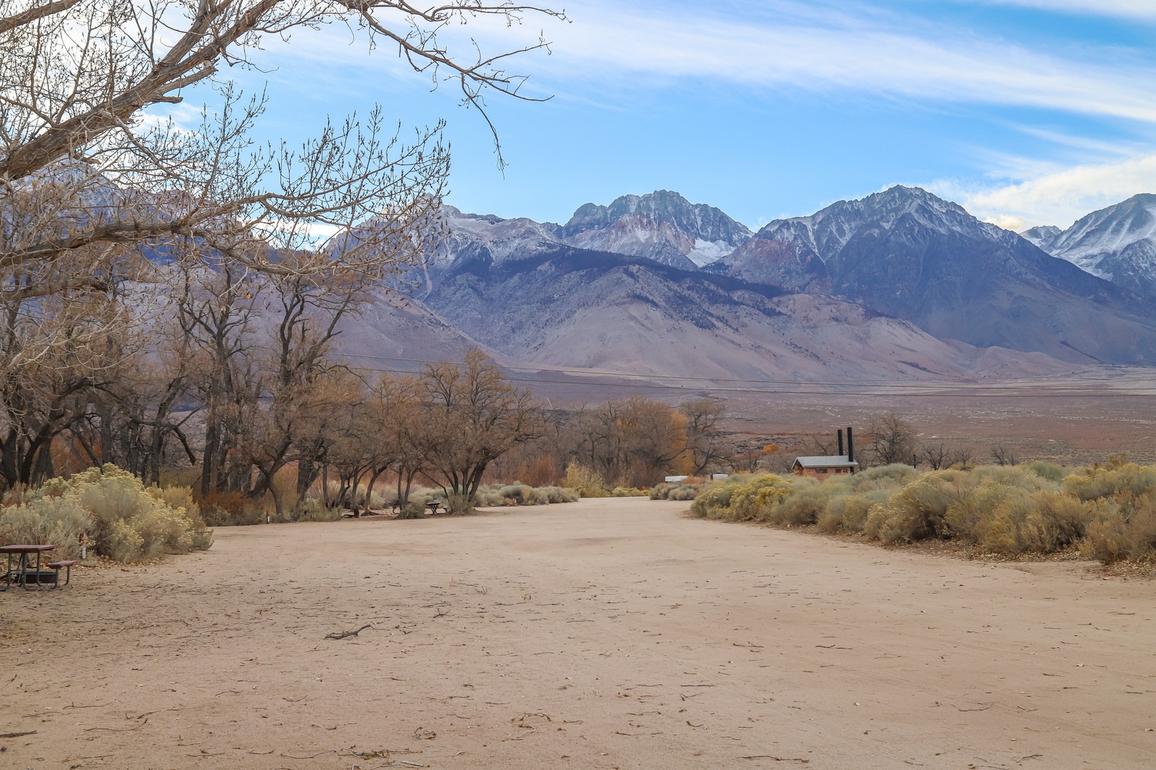 Camp sites are set alongside wide gravel areas running alongside the creek.