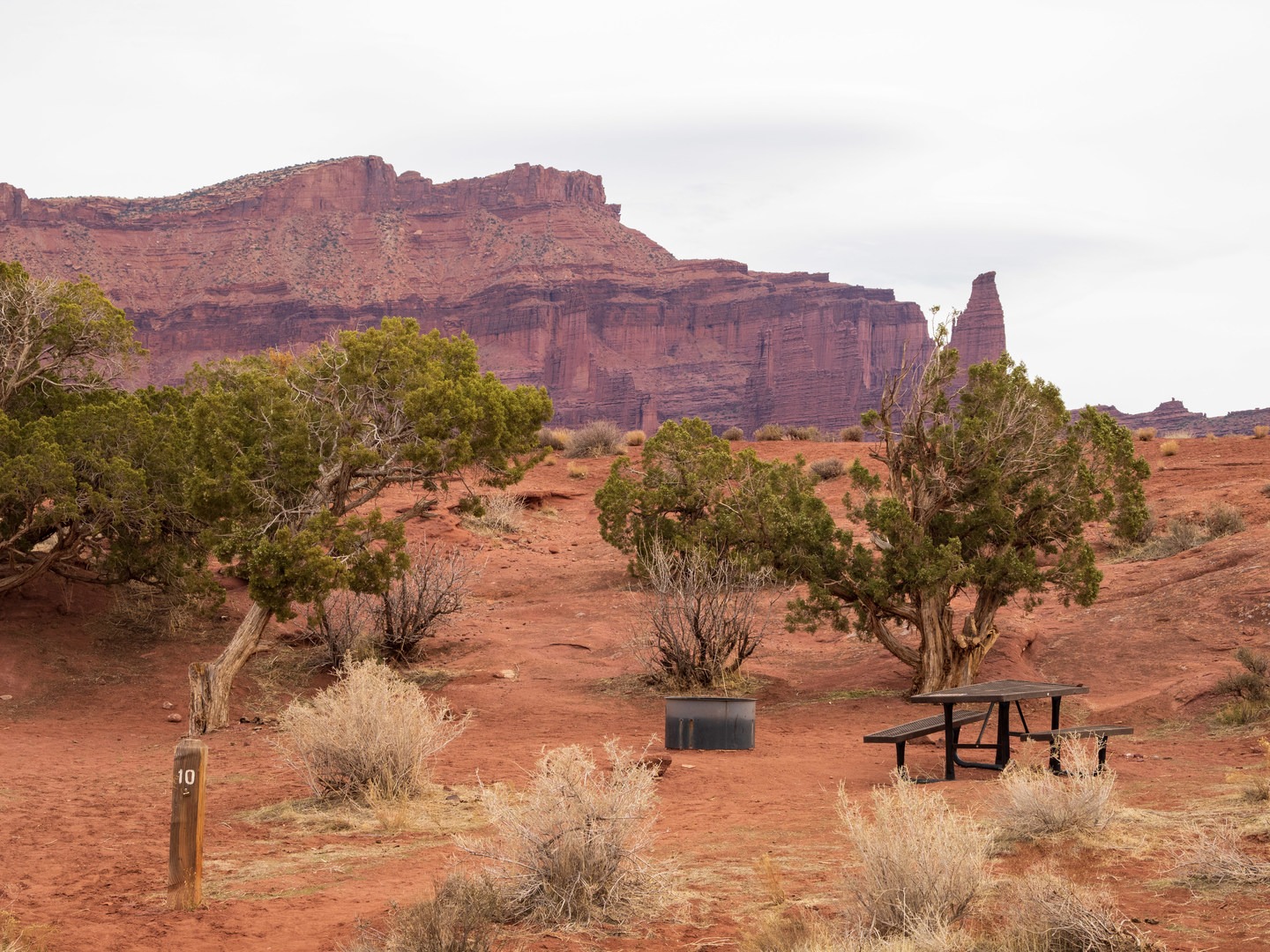 Campsite with a backdrop of the nearby Fisher Towers.