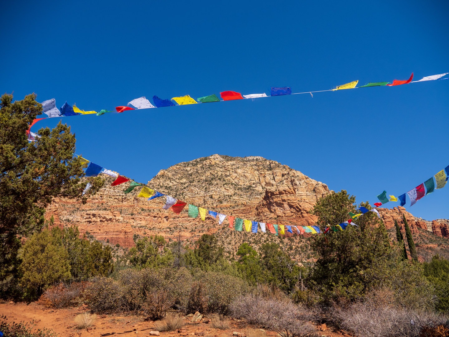 Prayer flags and Capitol Butte.