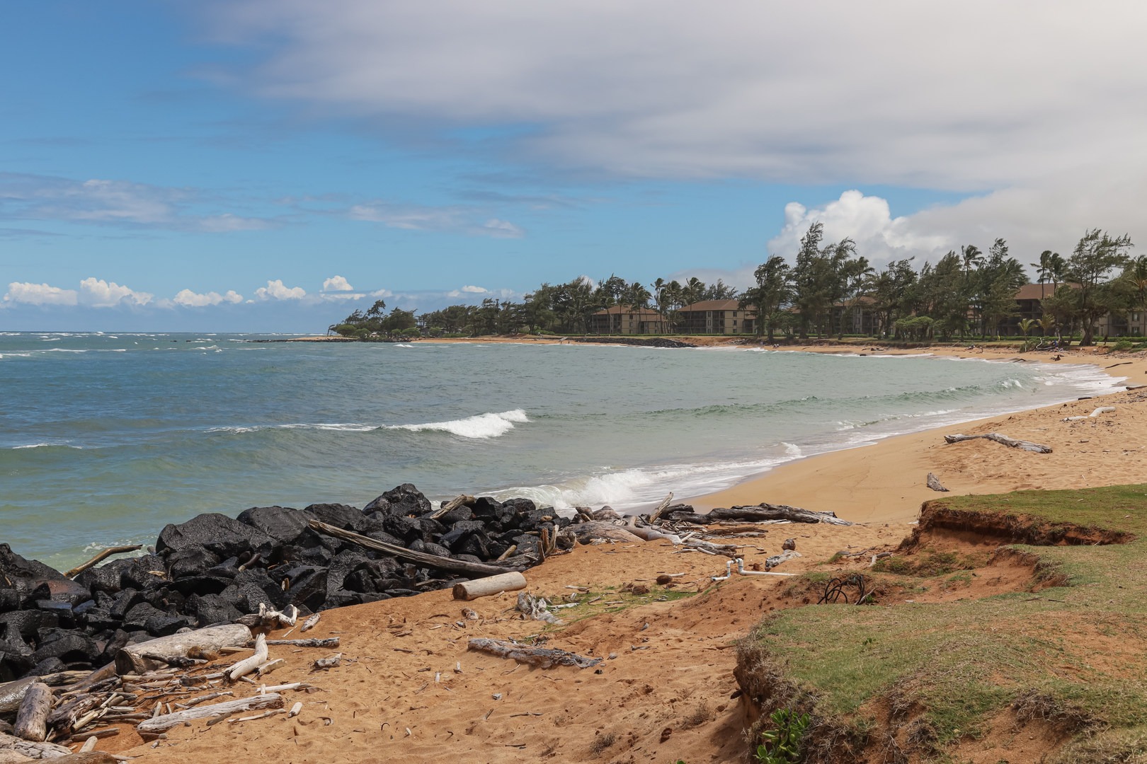 There are a few sandy areas along the beach park such as Kapa'a Beach. Though better beaches are located nearby.
