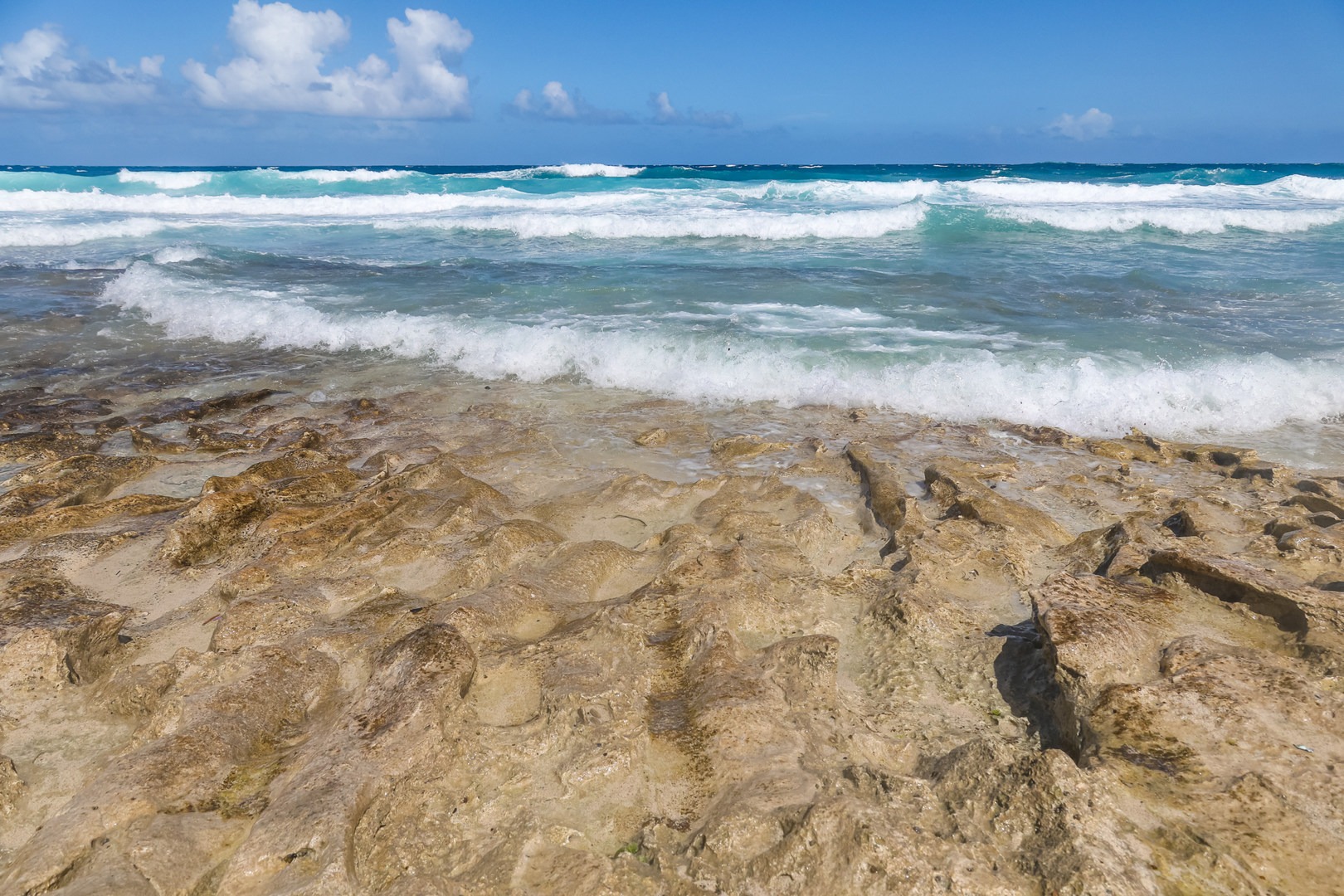 A mix of turquoise and orange at Dunes Beach.
