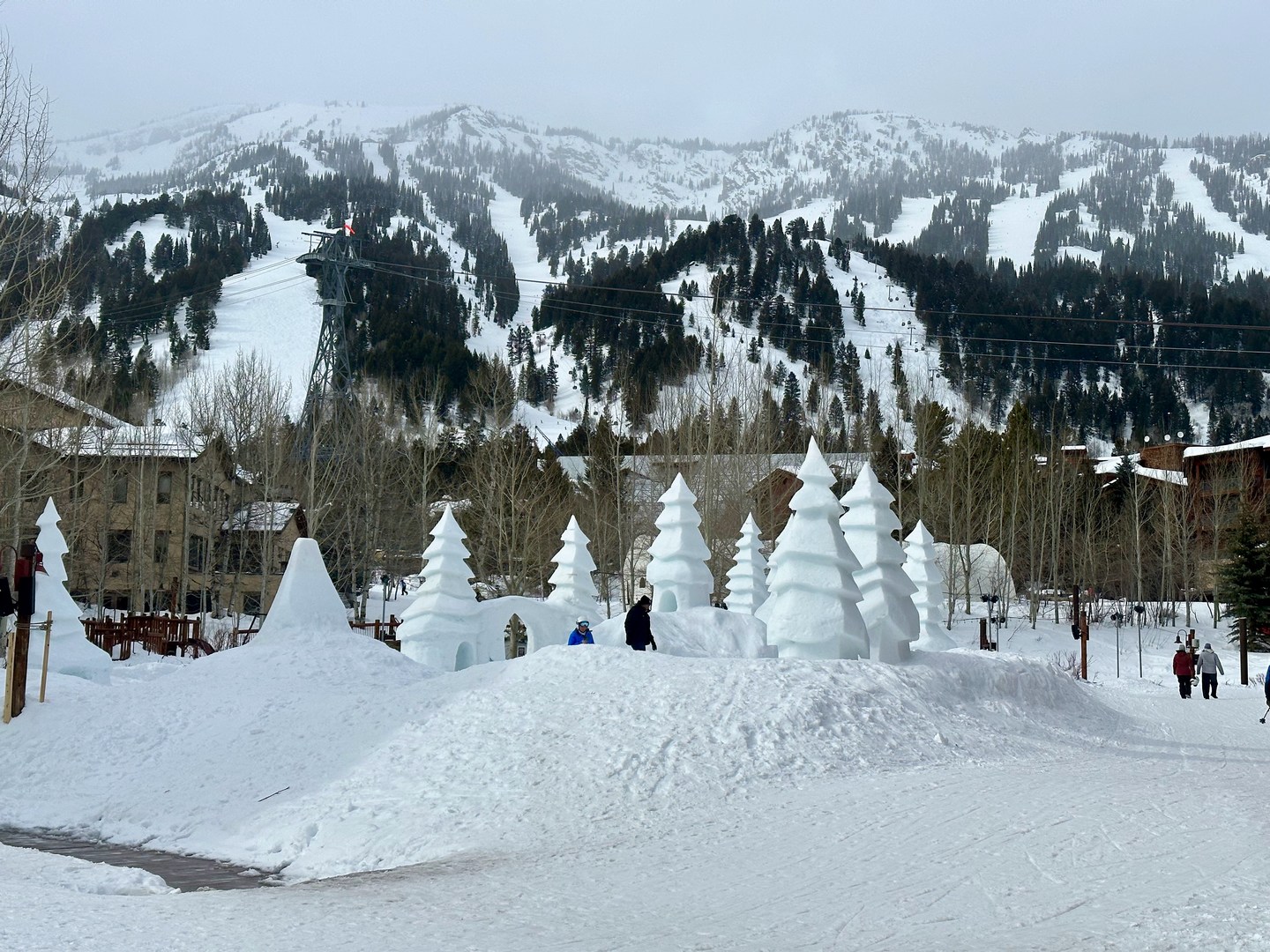 Snow sculptures area with Jackson Hole Resort in the background.