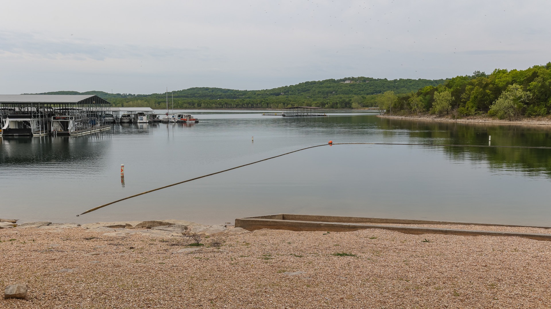 Protected swimming area, though it sits right beside a marina.