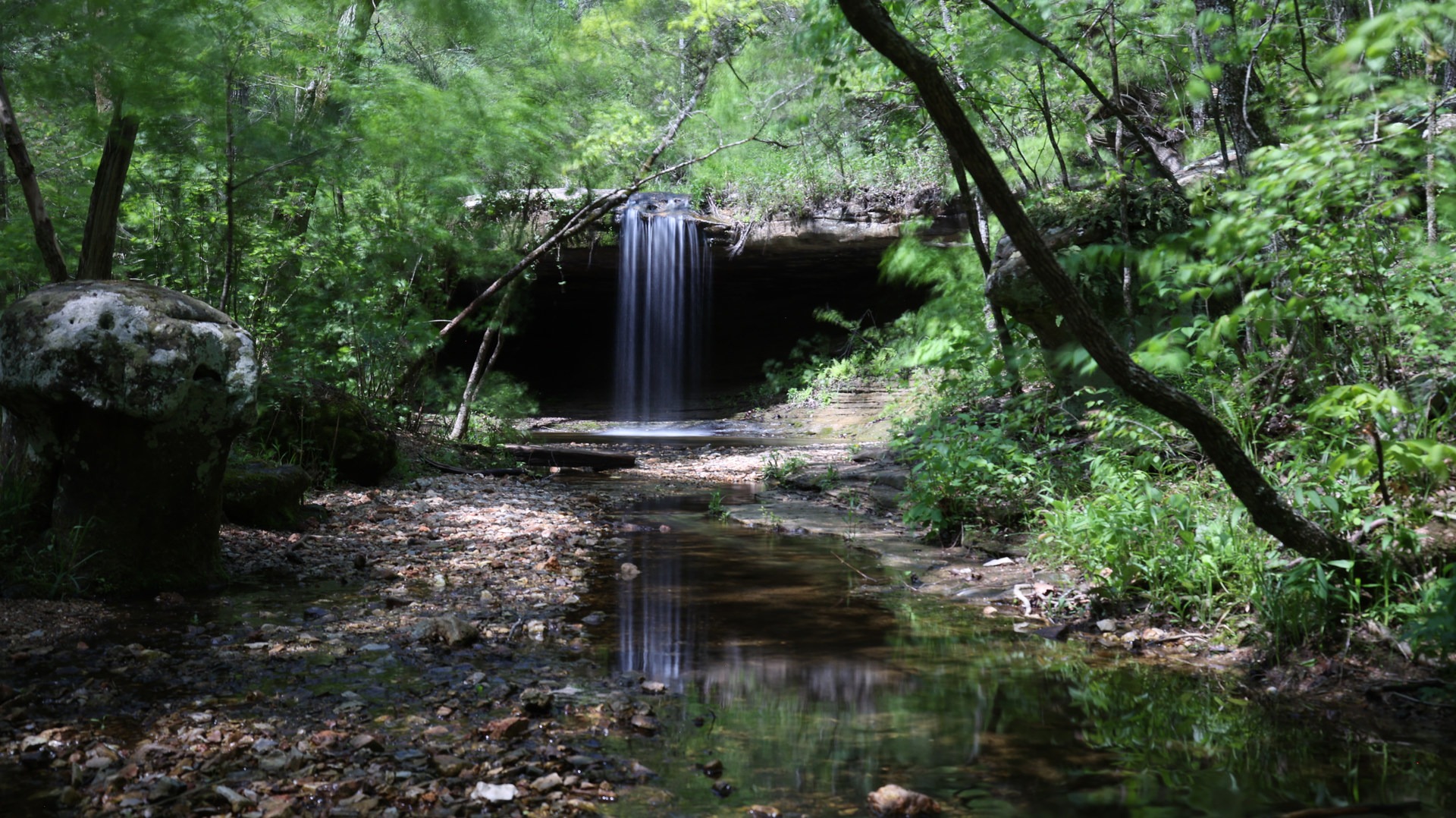 Glory B Waterfall sits in a scenic gully.