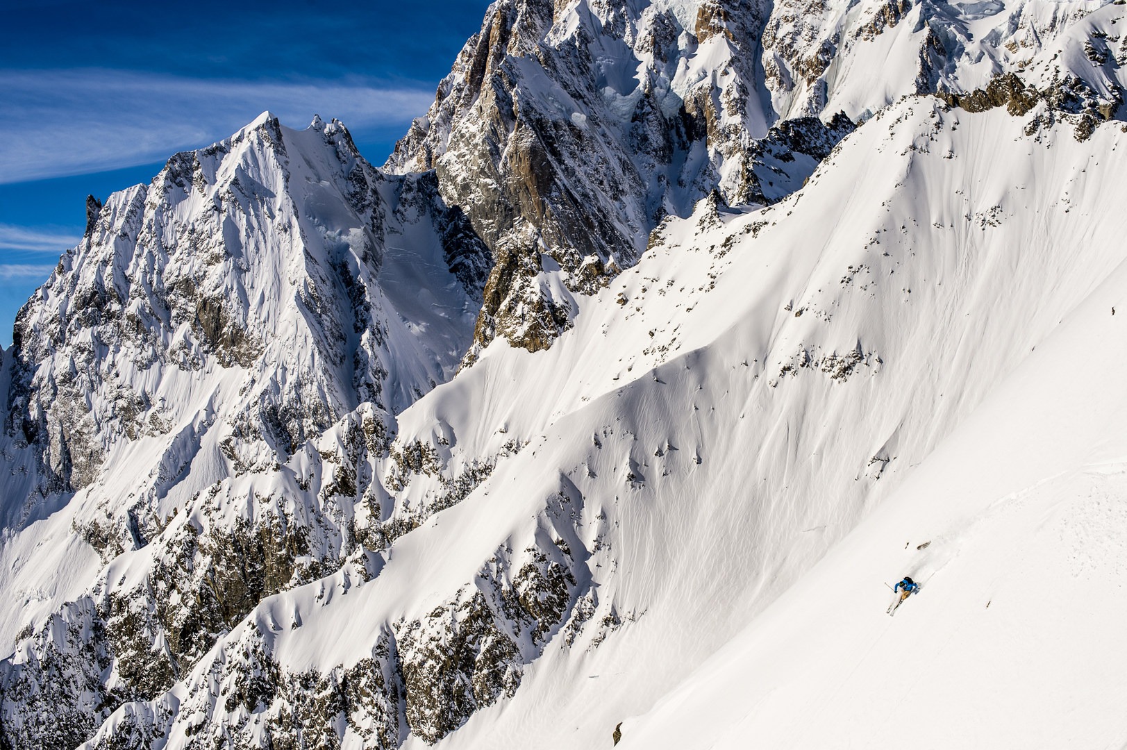 Kyle Taylor shredding under the Skyway Tram in Courmayeur, IT. For this line we climbed over the railing of the observatory deck at the Helbroner and skied pow to the valley floor 5,000+ feet below.