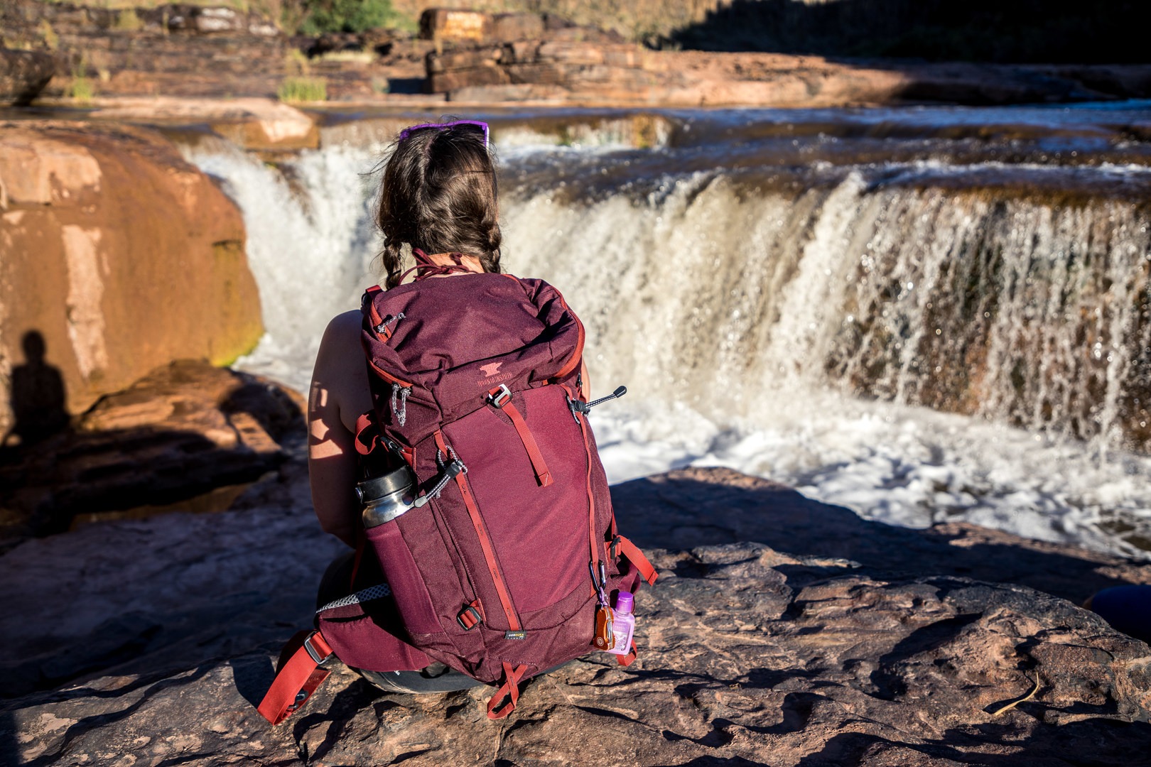 Admiring waterfalls with my Mountainsmith Mayhem 35 day pack