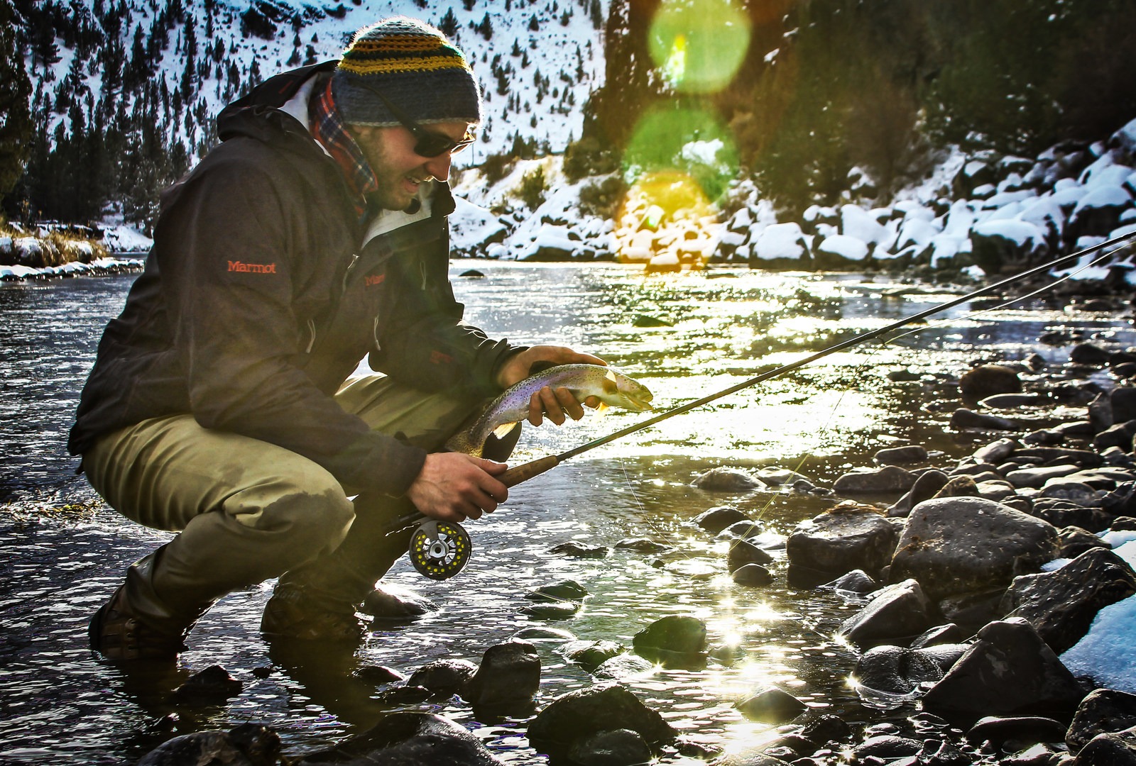 Author Derek Schroeder holds a nice winter rainbow trout from the Crooked River in Central Oregon