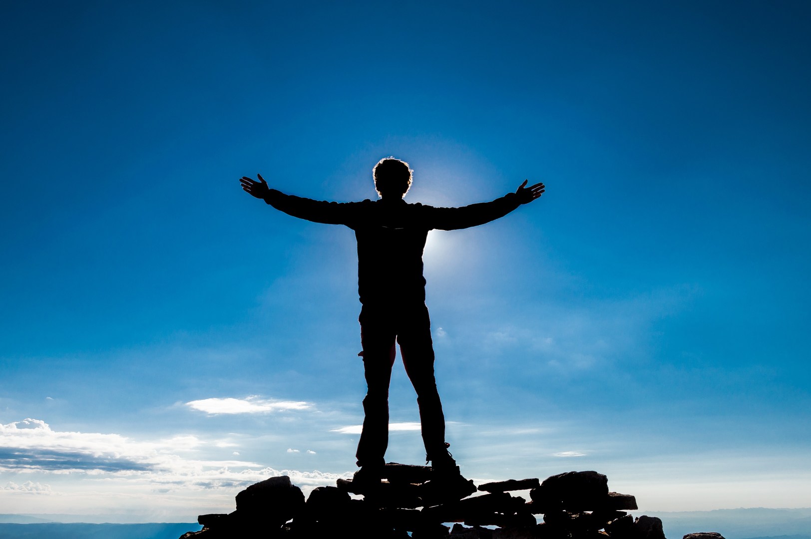 Standing on the summit of Mt. Peale in Utah.
