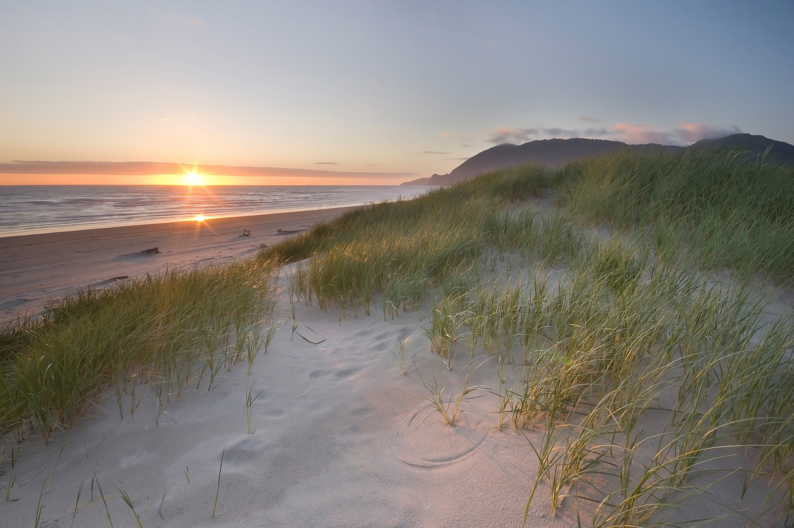 Sun sets over the dunes at Nehalem Bay State Park.