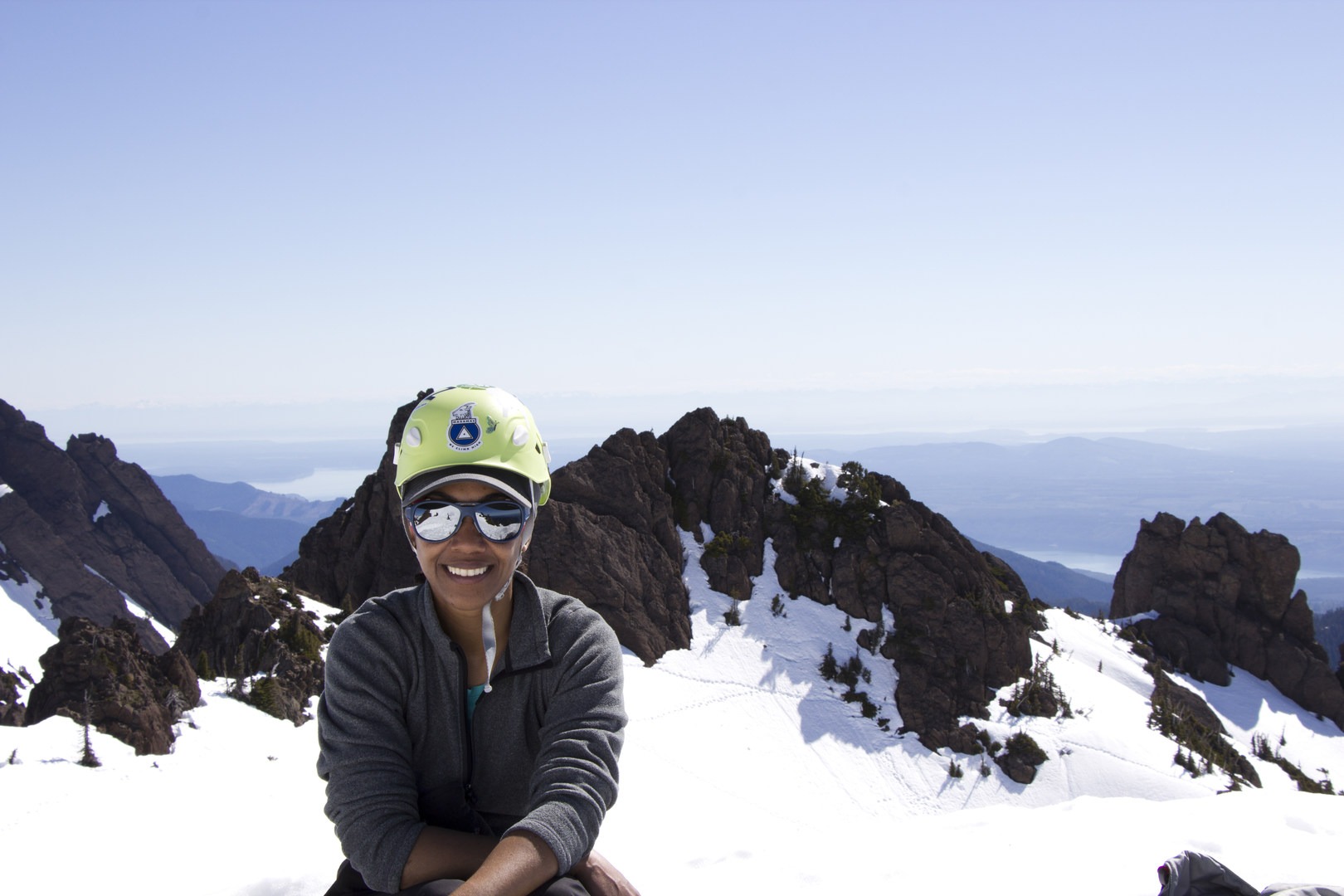 Enjoying views and a quick lunch break from the summit of Mount Ellinor, Washington. Photo credit by Nathan Kaul.
