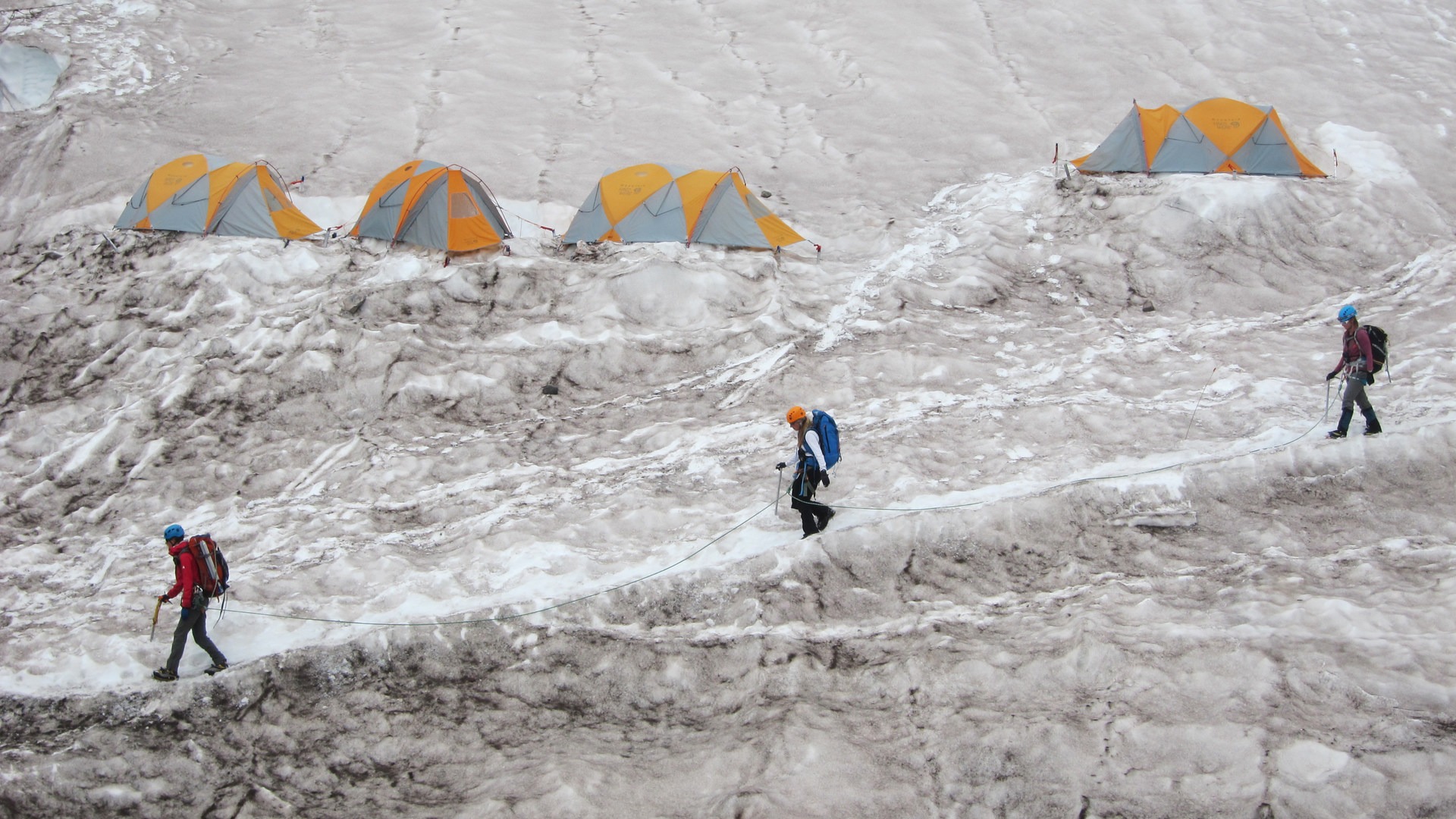 Climbers returning to camp after summiting Mount Rainier.