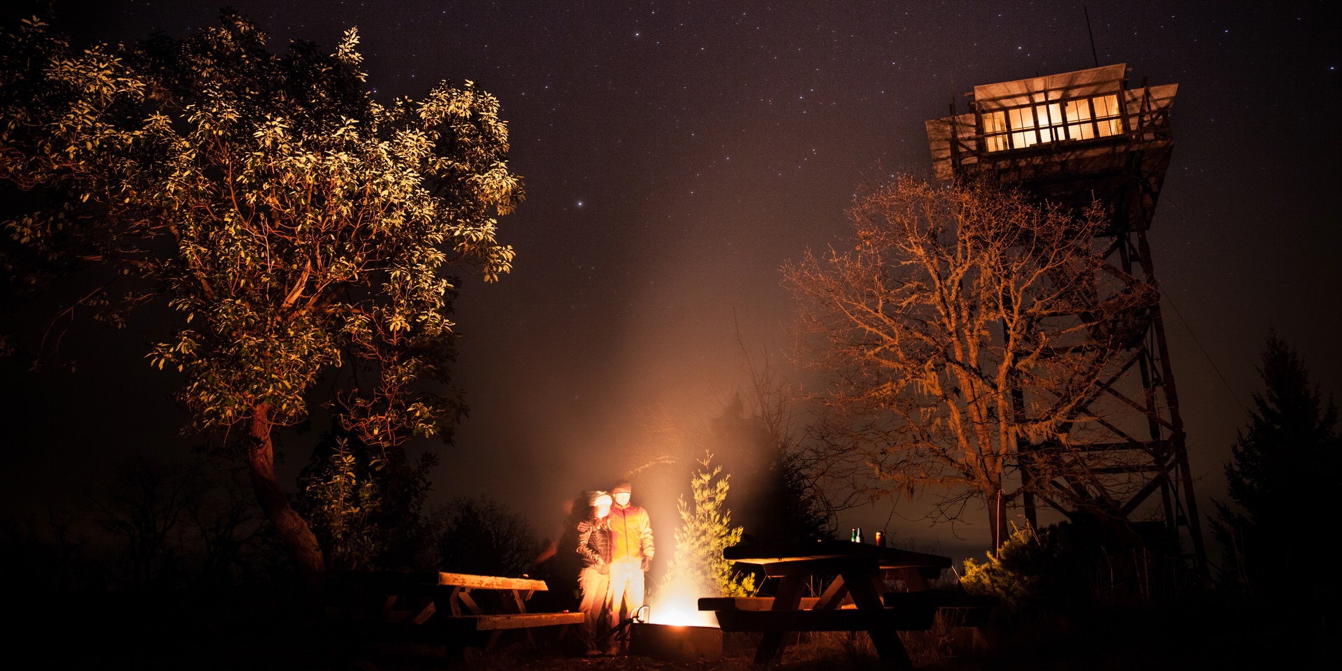 Campfire, beers and stars beneath Pickett Butte Fire Lookout.